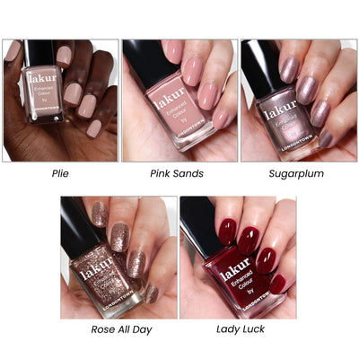 Five nail polish shades from LONDONTOWN's Holiday Luxe Collection displayed on hands: Plie (nude), Pink Sands (soft pink), Sugarplum (shimmery pink), Rose All Day (glittery rose gold), and Lady Luck (deep red). Each shade is shown on the nails.
