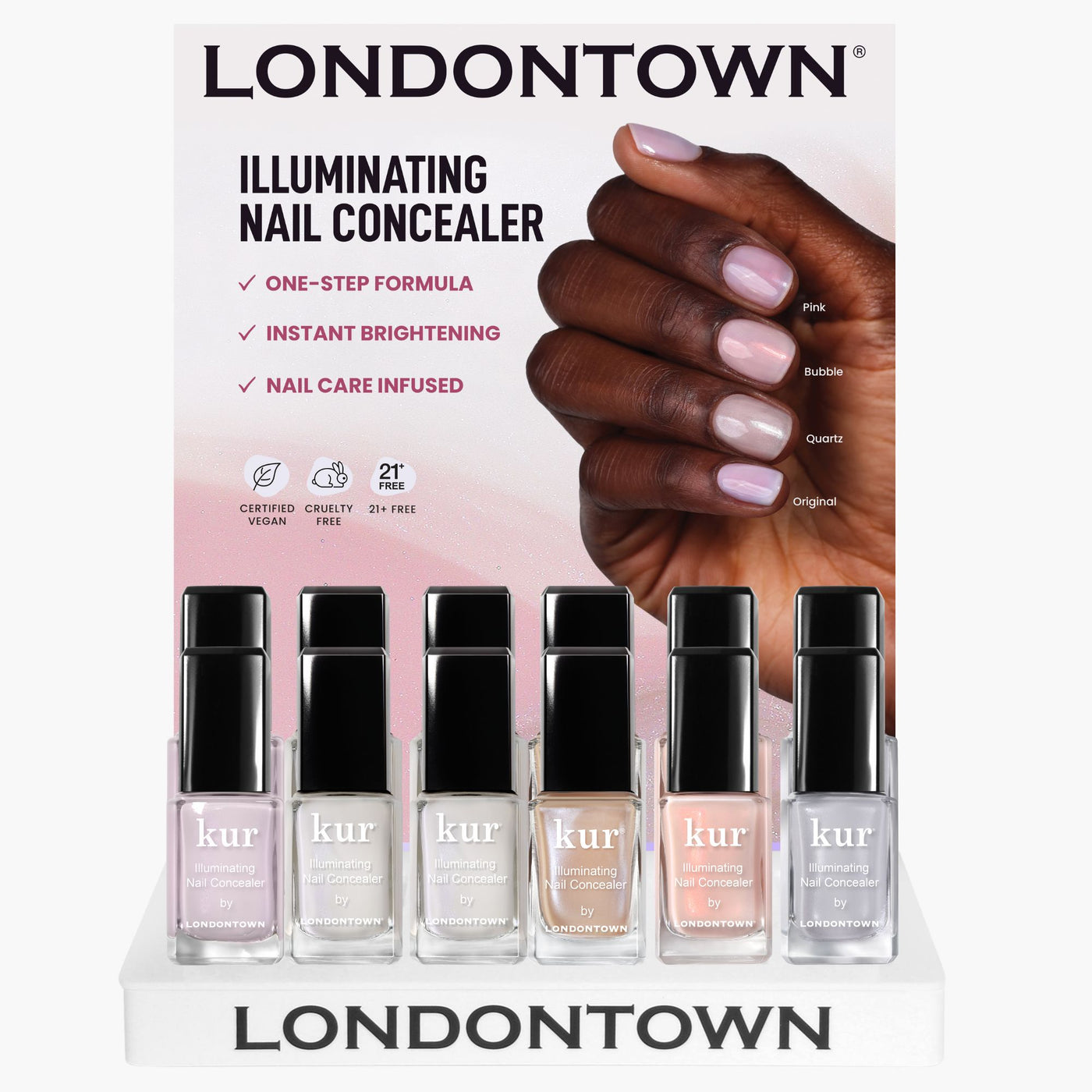 The Illuminating Nail Concealer POP Display by LONDONTOWN showcases six shades in bottles with a sign emphasizing benefits such as instant brightening and a cruelty-free formula.