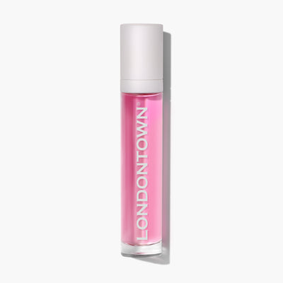 A clear, cylindrical tube of cuticle oil with vibrant dragonfruit liquid inside, labeled "LONDONTOWN" in white text. The cap is white, perfect for on-the-go applications.