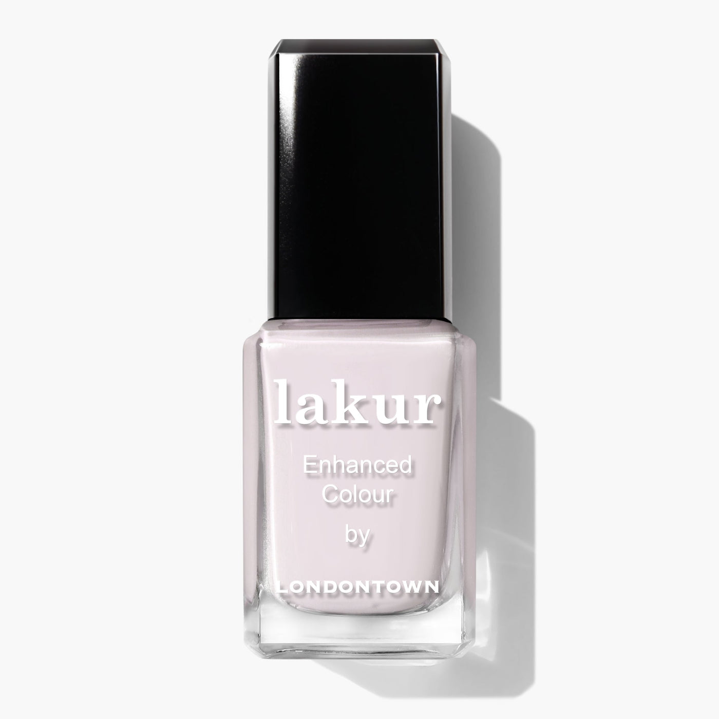 Bottle of Lakur Enhanced Colour nail polish by LONDONTOWN, featuring a light pink-tinted cream shade and a black cap called Ski Bunny (Professional).