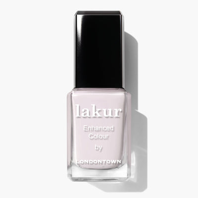 Bottle of Lakur Enhanced Colour nail polish by LONDONTOWN, featuring a light pink-tinted cream shade and a black cap called Ski Bunny (Professional).