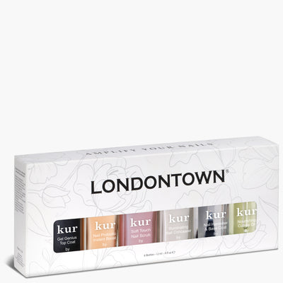 The Londontown Total Care Set from LONDONTOWN includes six nail care products, each bottle specifically labeled for different uses such as top coat, nail hardener, and nail scrub. The set comes in a beautifully floral-designed package, ensuring your nails are prepped to polished perfection.