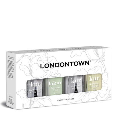 A box labeled "All the Sage Mani Set" from LONDONTOWN, containing four bottles of nail care products perfect for the spring season: a light green nail hardener and base coat, an enhanced color, a high gloss top coat, and a nourishing cuticle oil.