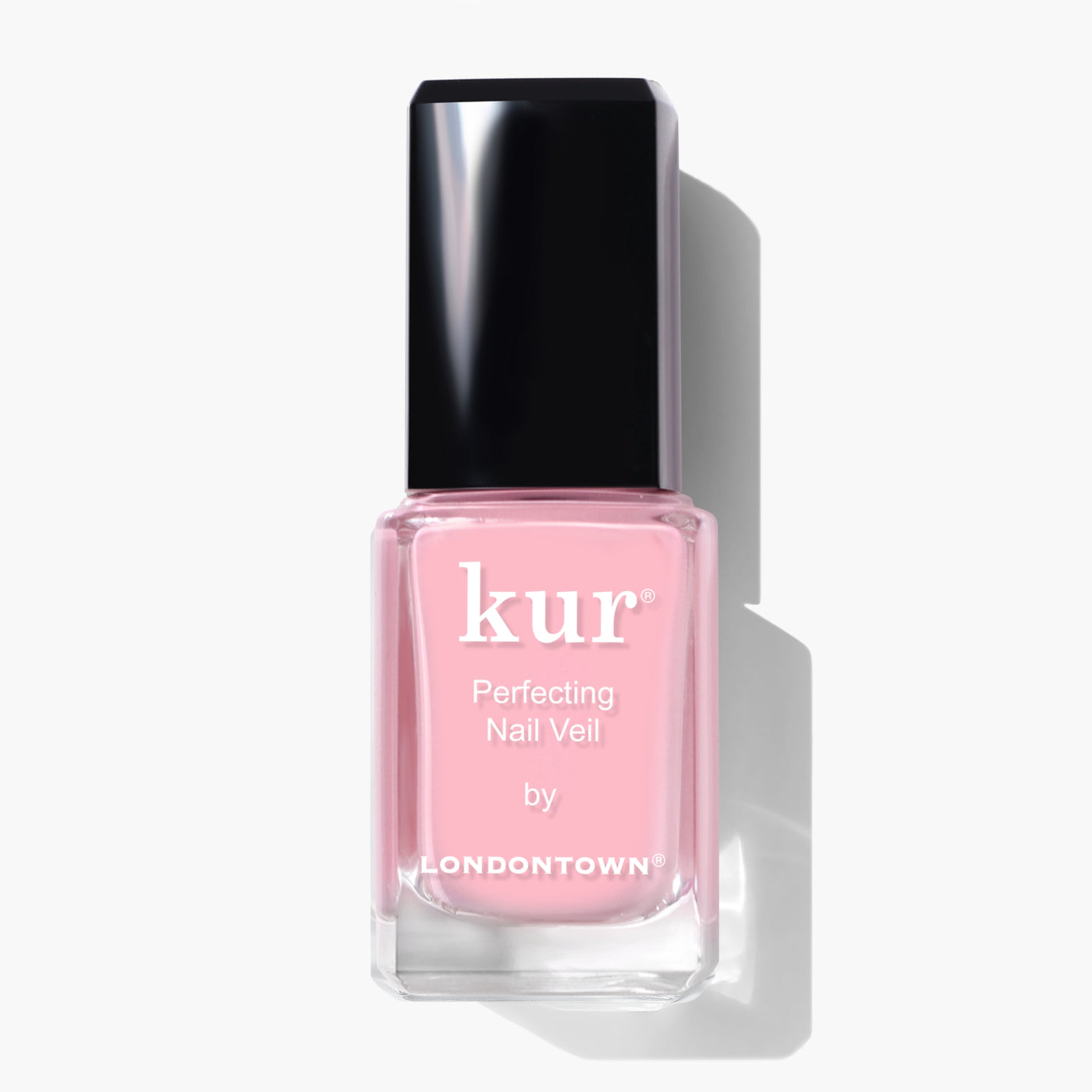 A bottle of LONDONTOWN Perfecting Nail Veil #7 in pink, with a power-packed formula, featuring a black cap and white text on the label, set against a white background.