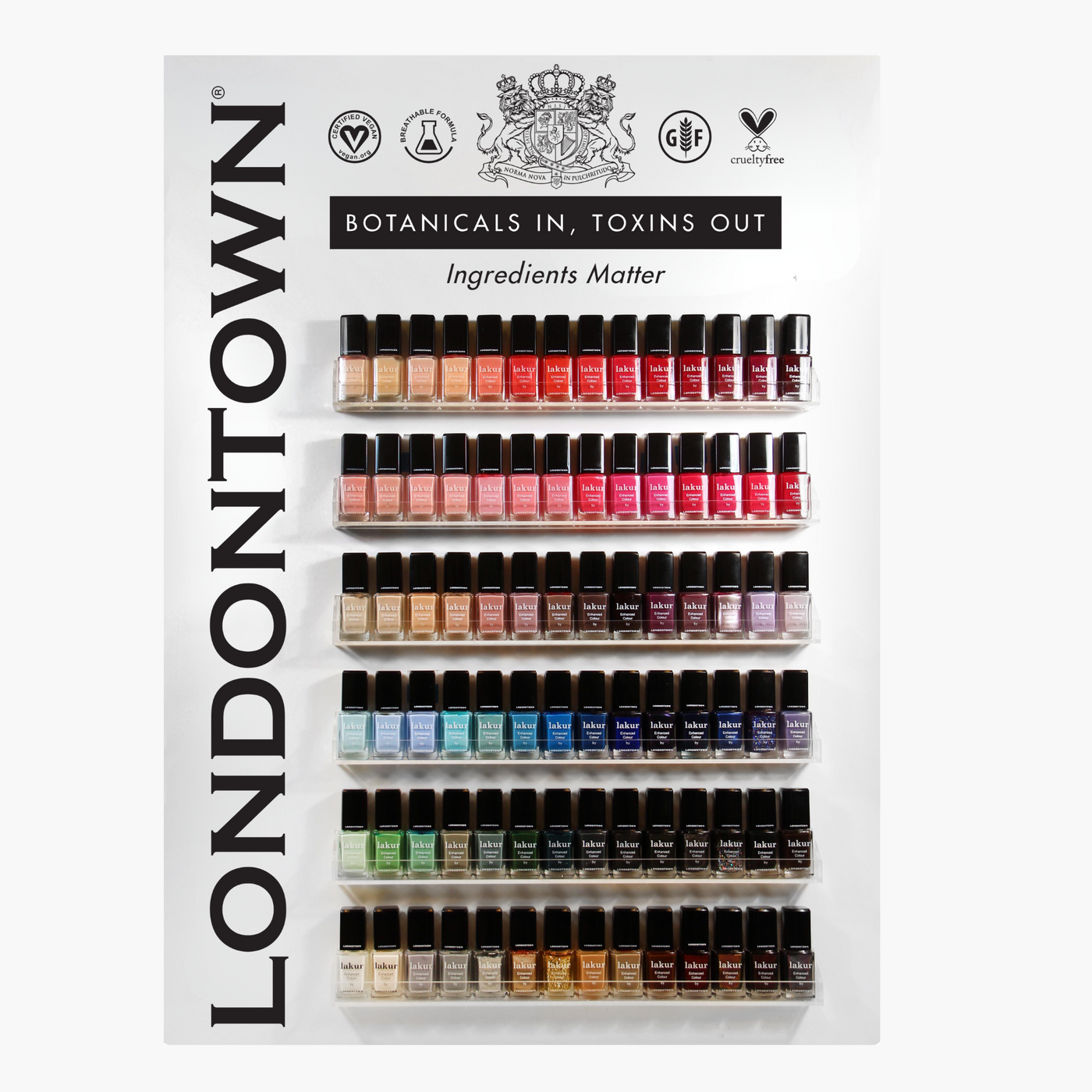 A display of LONDONTOWN Professional Wall Display w/Product (Lakur) nail polishes arranged by color in rows on a white background, with text stating "Botanicals in, toxins out" and "Ingredients matter.