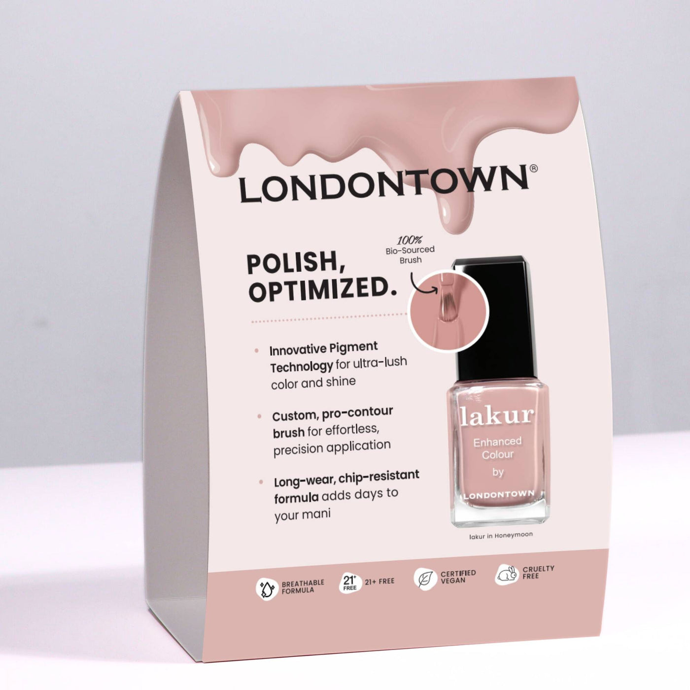 A Lakur Shelf Talker for LONDONTOWN lakur nail polish in the shade "Honeymoon," showcasing features such as innovative pigment technology, a pro-contour brush, long-wear, chip-resistant formula, and cruelty-free.