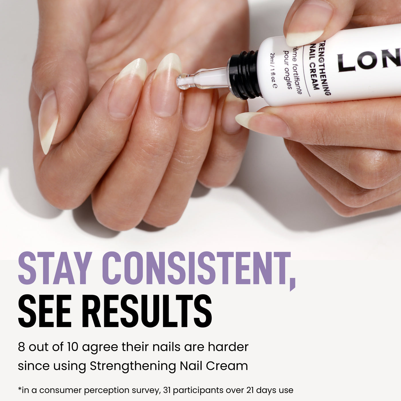 A person applies LONDONTOWN Strengthening Nail Cream to their fingernails. Surveys show improved nail hardness and enhanced nail health with regular use.