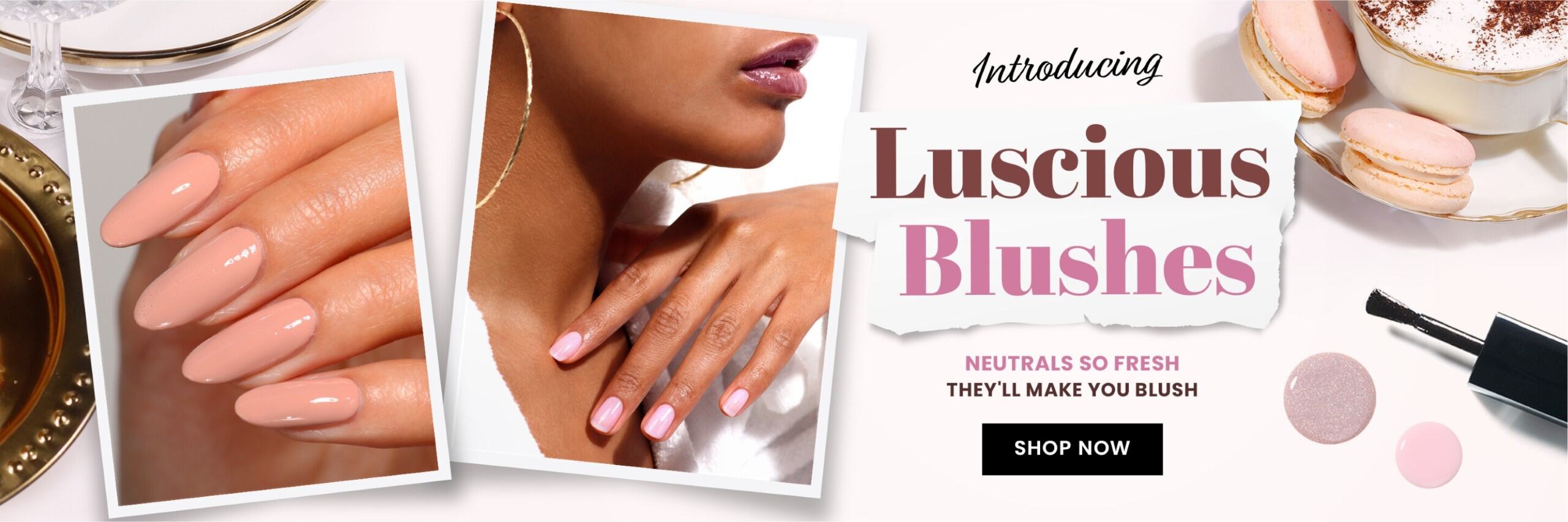 Collage with close-up of manicured nails in soft pink tones. Text: "Introducing Luscious Blushes. Neutrals so fresh they'll make you blush. Shop now." Nearby are macarons, a powder compact, and lipstick.