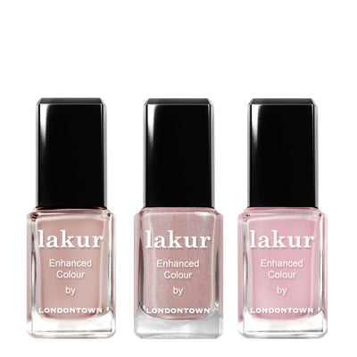 The LONDONTOWN Luscious Blushes lakur Trio features three fresh shades of pink and beige nail polish bottles standing side by side.