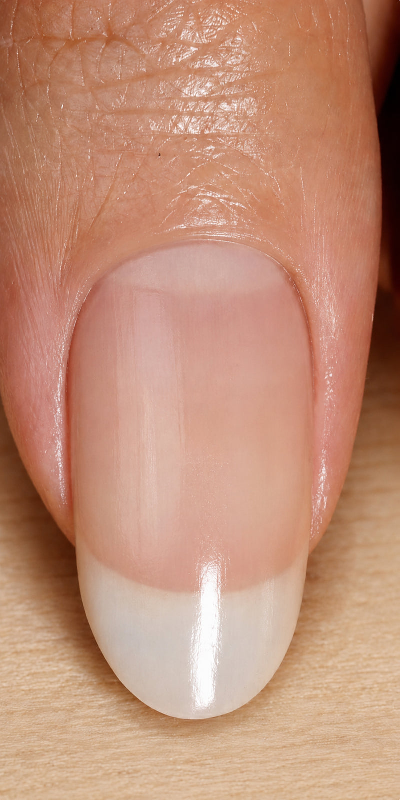 Natural nail with a glossy finish after Luxe Length Nail Gloss