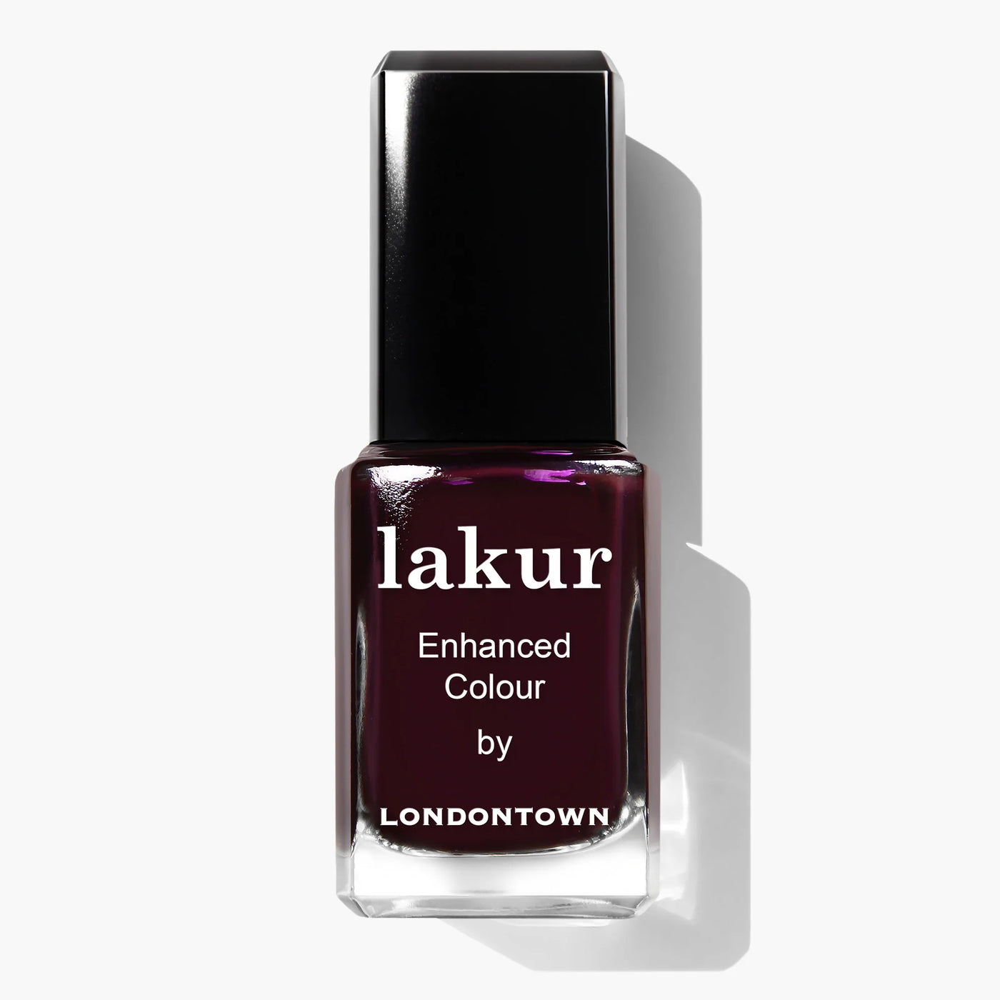 A bottle of deep purple nail polish labeled "Bell in Time (Professional) by LONDONTOWN," featuring a breathable formula, sits elegantly on a white background.