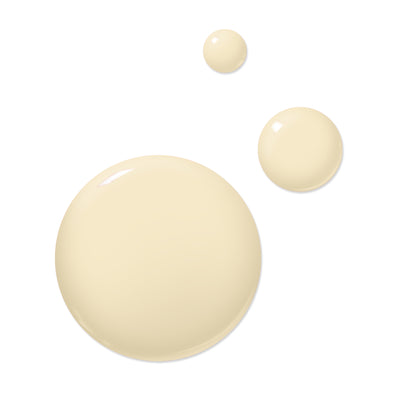 Three beige liquid blobs of varying sizes are arranged against a white background, showcasing the smooth consistency of LONDONTOWN's vegan cruelty-free nail polish, Buttercup.