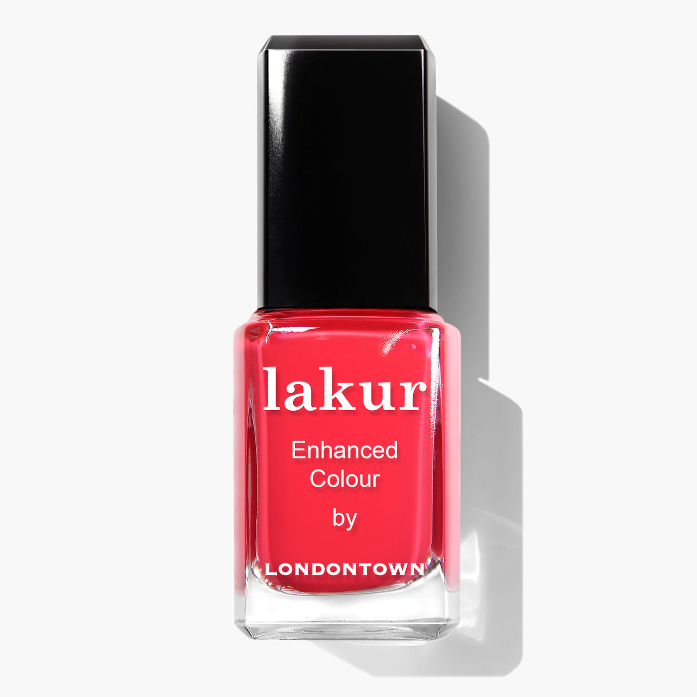 A bottle of Down to Dilly nail polish by LONDONTOWN in a bright red shade, set against a white background. This vegan, cruelty-free nail polish exemplifies LONDONTOWN's commitment to quality and ethical beauty.