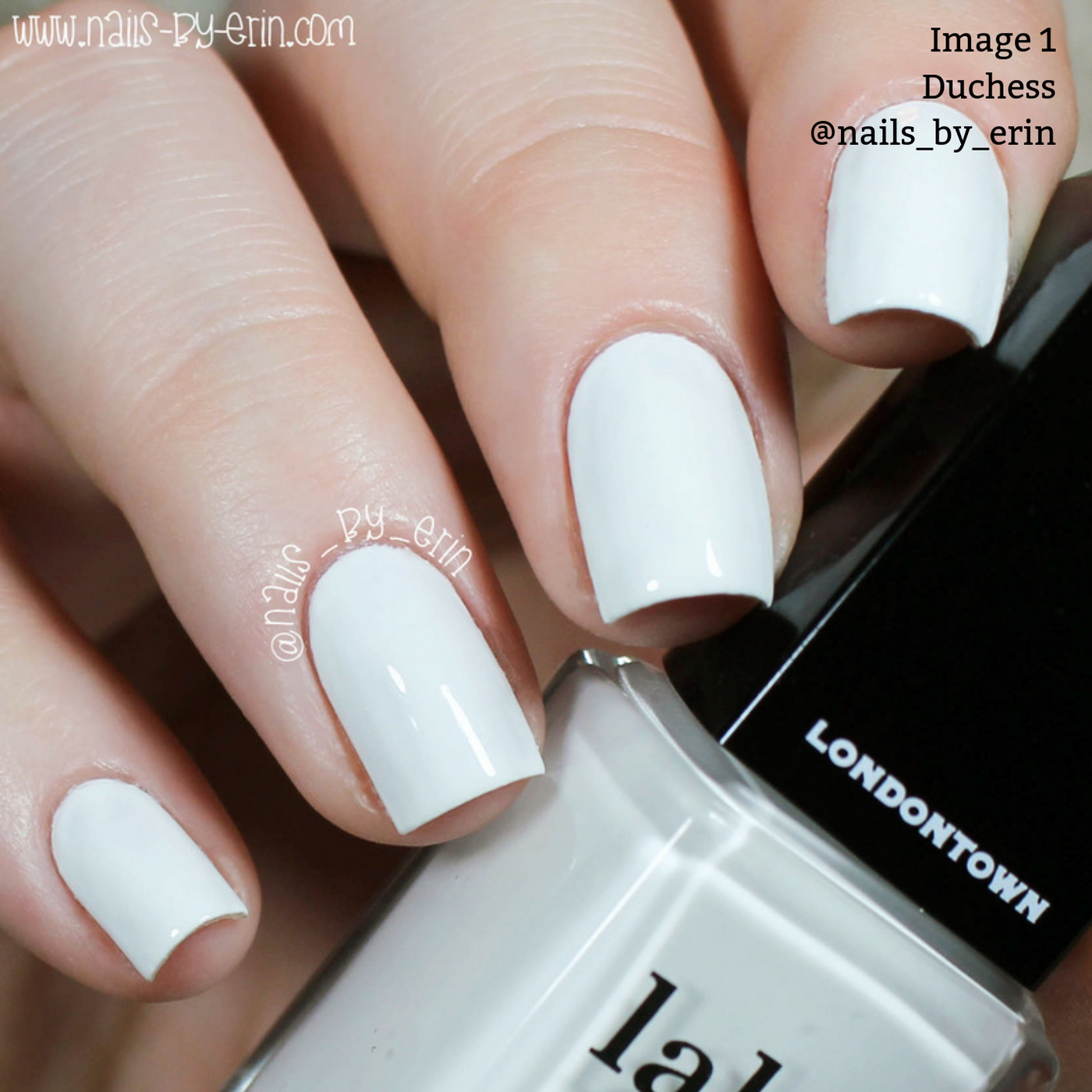 Close-up of a hand showcasing nails adorned with LONDONTOWN's Duchess pure crème white nail polish, perfect for a chic French manicure.