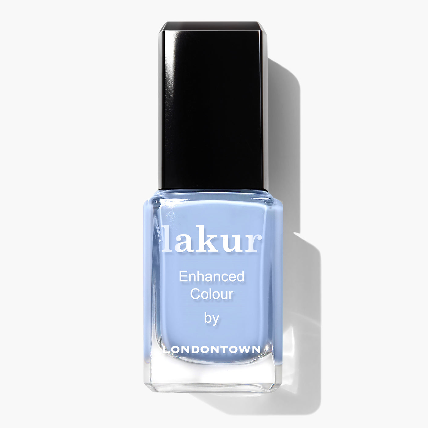 A bottle of LONDONTOWN's "In the Clouds" vegan nail polish in a light blue shade with a black cap, perfect for a cruelty-free manicure.