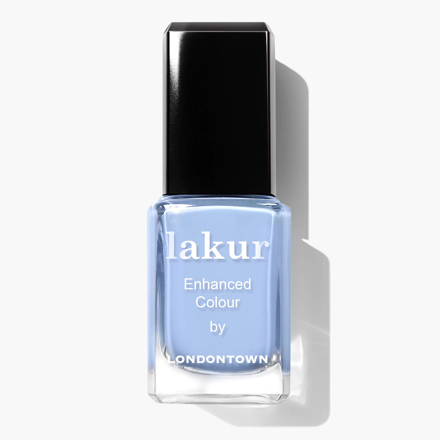 A bottle of light blue nail polish named "In the Clouds (Professional)" by LONDONTOWN, featuring "Enhanced Colour by Londontown" on the label. This cruelty-free, vegan formula comes with a black, glossy cap, ensuring both beauty and ethics are in your hands.