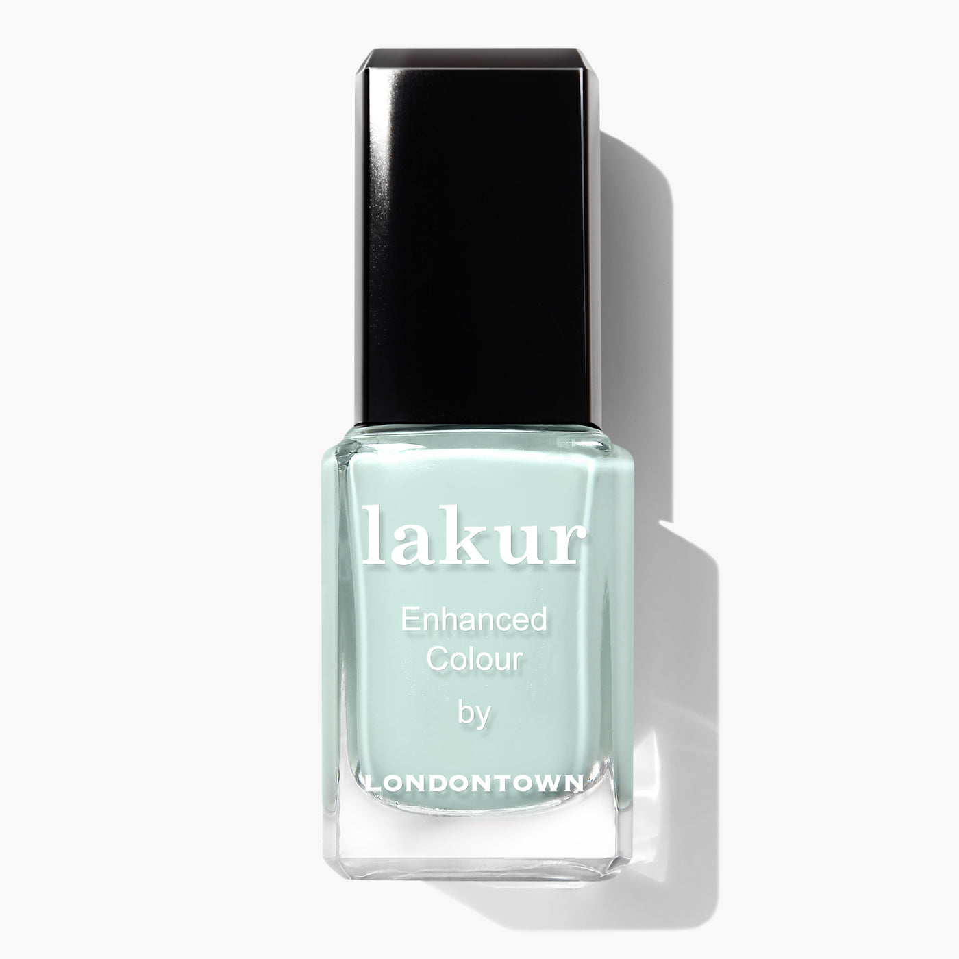 A bottle of LONDONTOWN Mint No Chip vegan nail polish labeled "Enhanced Colour" in a mint creme shade with a black cap.