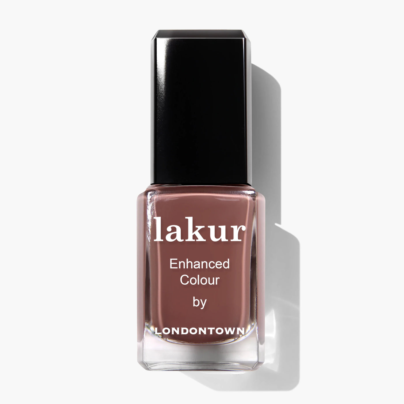 A bottle of Mudslide (Professional) nail polish by LONDONTOWN, featuring a rectangular shape with a black cap, filled with a muted pink shade, Florium Complex infused and vegan cruelty-free for conscientious beauty.