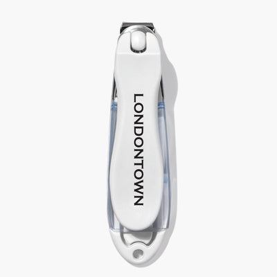A white Flex Cut Nail Clipper (Professional) featuring the "LONDONTOWN" brand name in black letters on its handle. The ultra-precise clippers include an attached nail file for added convenience.