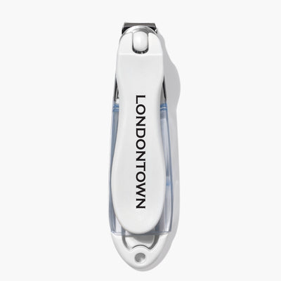 The Flex Cut Nail Clippers by LONDONTOWN are white metal with the brand name "LONDONTOWN" in black text on the handle, featuring an all-in-one design.