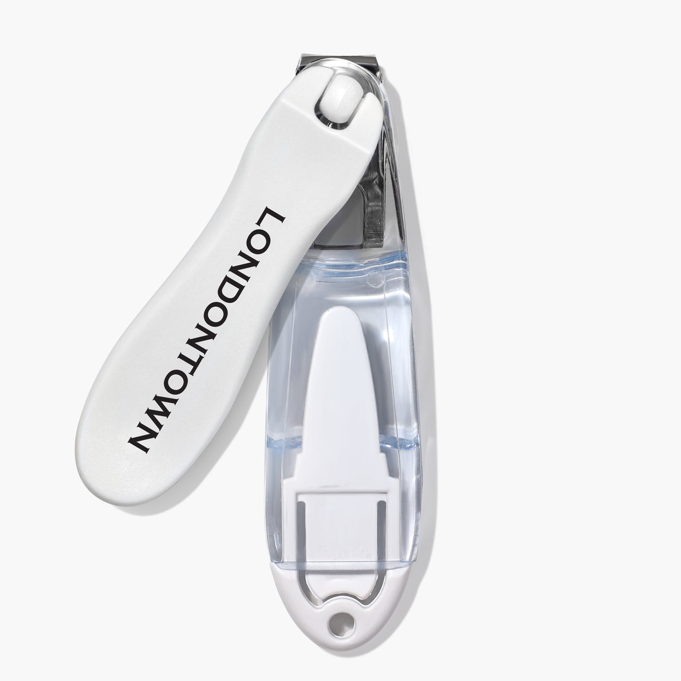 The Flex Cut Nail Clippers from LONDONTOWN, featuring a white handle with the brand name printed on it, come equipped with an ultra-precise silver cutting blade. They also include a clear plastic case for catching nail clippings and an integrated nail file.