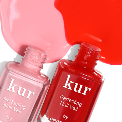 Two bottles of "Perfecting Nail Veil #7" by LONDONTOWN, one featuring pink and the other red nail polish, both packed with care and vibrant color. Corresponding paint swatches in the background complete this stunning duo.