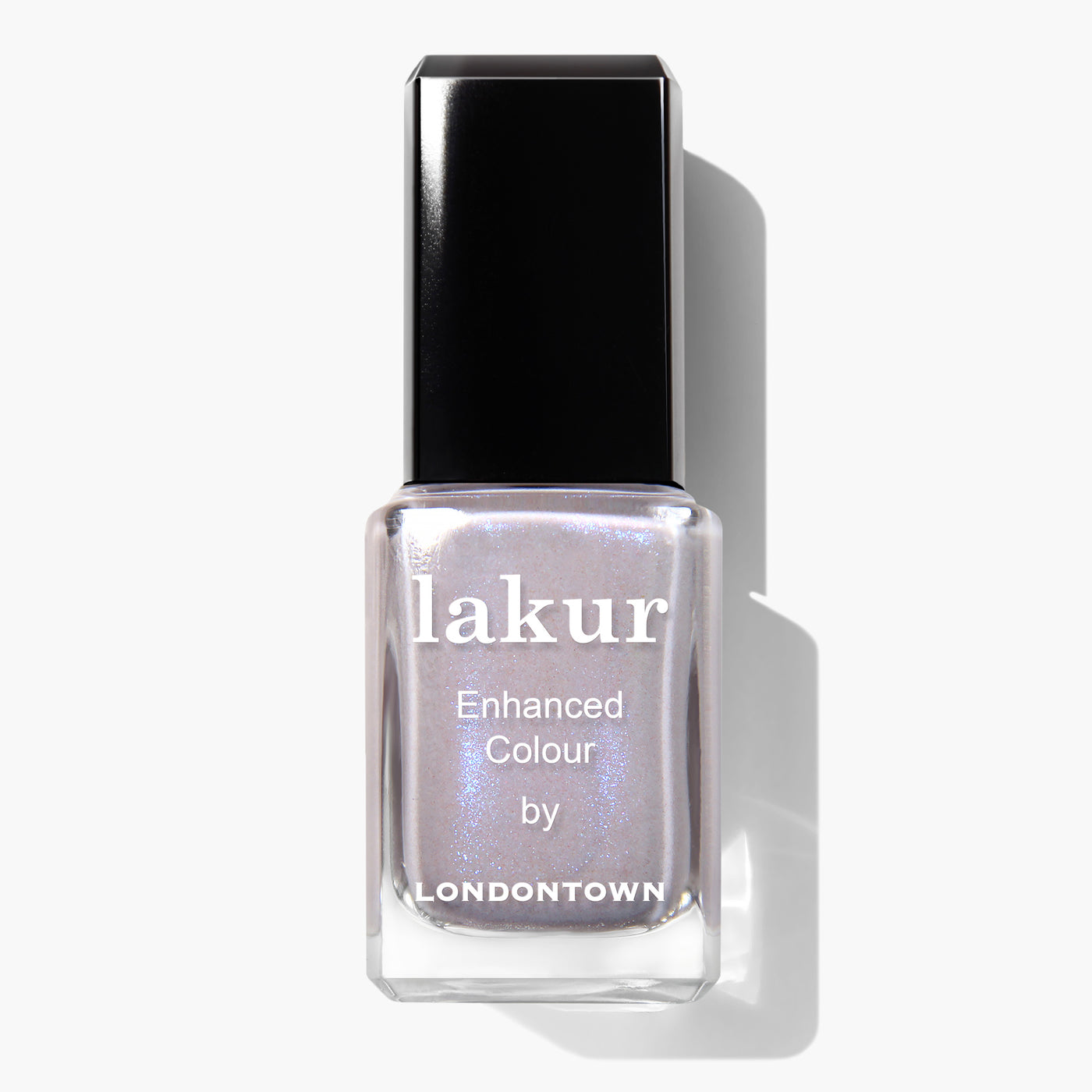 A bottle of LONDONTOWN's Opal nail polish with a shimmering lilac metallic sheen, featuring a black cap and clear glass that displays the subtle shimmery shade inside. This cruelty-free, vegan nail polish is perfect for adding an elegant touch to your look.