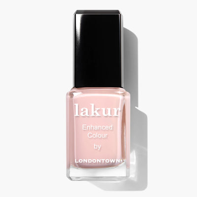A bottle of Peach Pop (Professional) nail polish by LONDONTOWN, featuring a peachy keen shade with a black cap, and is both cruelty-free and vegan.