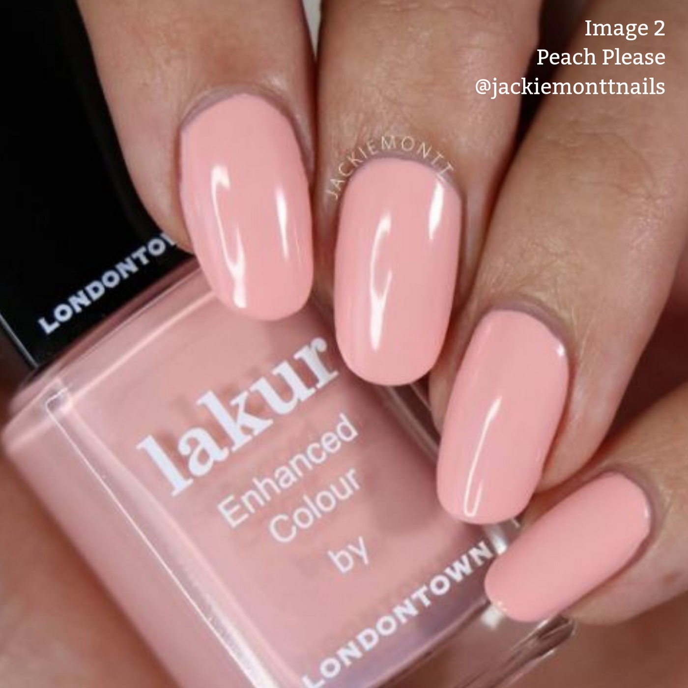 Close-up of a hand with neatly painted nails in a pale peach creme shade, holding a bottle of LONDONTOWN's Lakur nail polish. The text reads “Image 2 Peach Please @jackiemonttnails” highlighting the vegan, cruelty-free formula.
