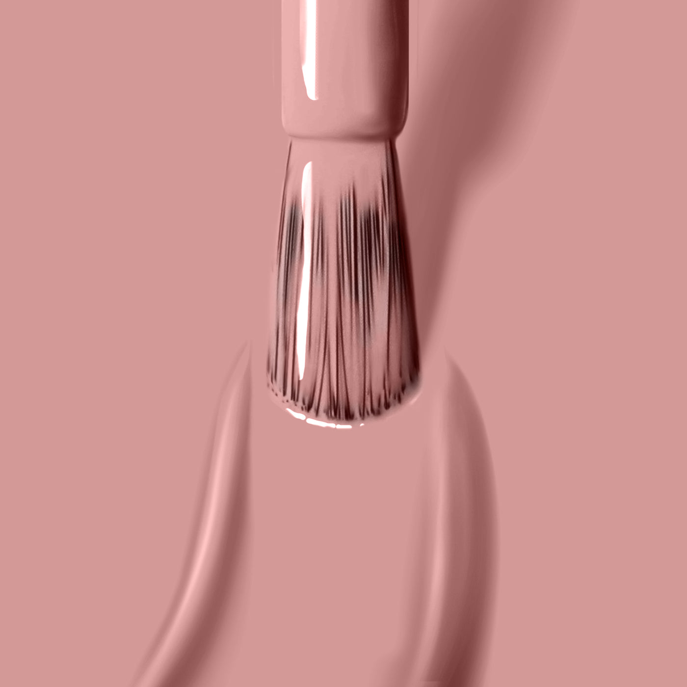 Close-up of a nail polish brush applying a smooth layer of Pink Sands by LONDONTOWN, enriched with Florium Complex Infused formula, on a surface.