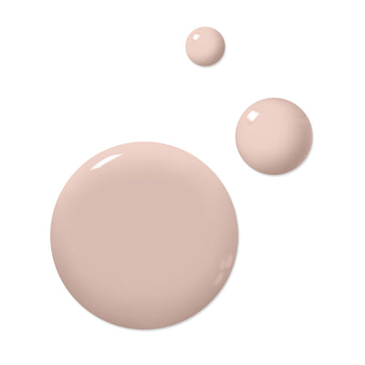Three beige droplets of Plié liquid foundation from LONDONTOWN, in varying sizes on a white background, reminiscent of ballet slipper nail polish hues, beautifully capture elegance and grace.