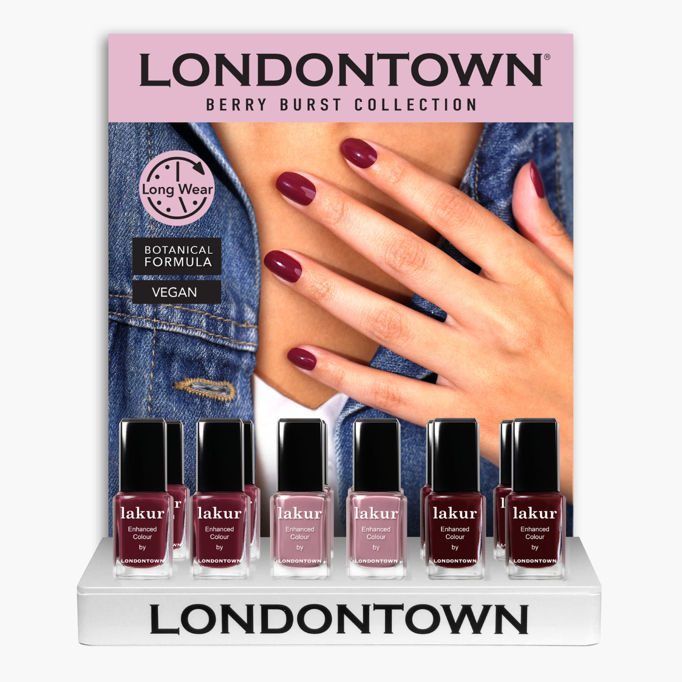Showcase of LONDONTOWN's Berry Burst Pop Display, featuring six bottles of vegan nail polish in an array of red and pink hues, accompanied by promotional text emphasizing their long-lasting botanical formula.