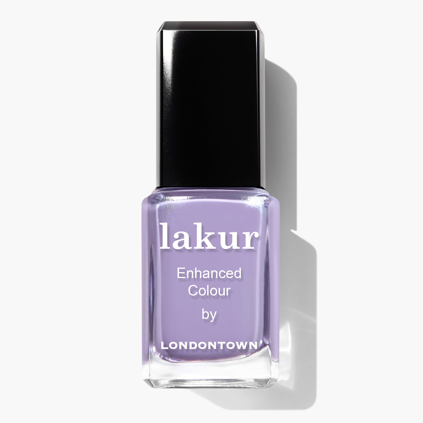 A bottle of Trolley Away by LONDONTOWN, featuring a lilac crème shade and a black cap, is vegan and cruelty-free.