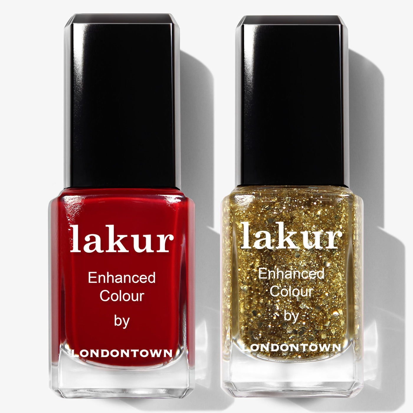 The LONDONTOWN Merry & Bright Duo includes two Lakur nail polishes: one red and one glittery gold, both labeled “Enhanced Colour.”.