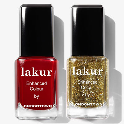 The LONDONTOWN Merry & Bright Duo includes two Lakur nail polishes: one red and one glittery gold, both labeled “Enhanced Colour.”.