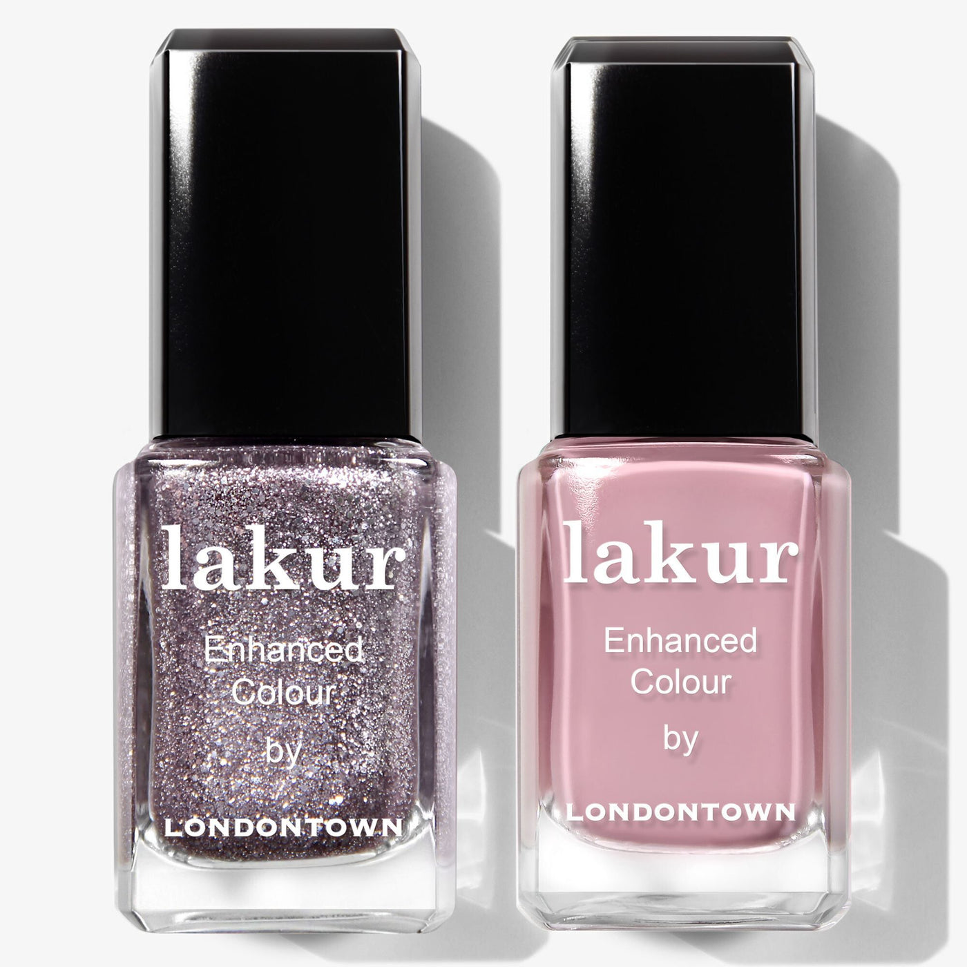 The LONDONTOWN Midnight Frost Duo includes two lakur nail polishes: one in glittery silver and another in solid light pink.