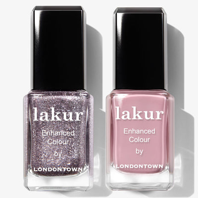 The LONDONTOWN Midnight Frost Duo includes two lakur nail polishes: one in glittery silver and another in solid light pink.