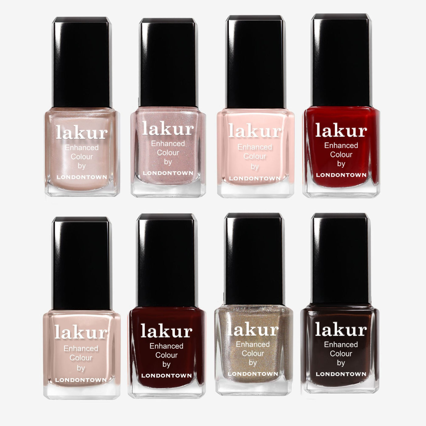 Eight LONDONTOWN Merry Minis Set Lakur nail polishes are arranged in two rows, displaying shades from nude and pink to red, burgundy, and metallic gold.