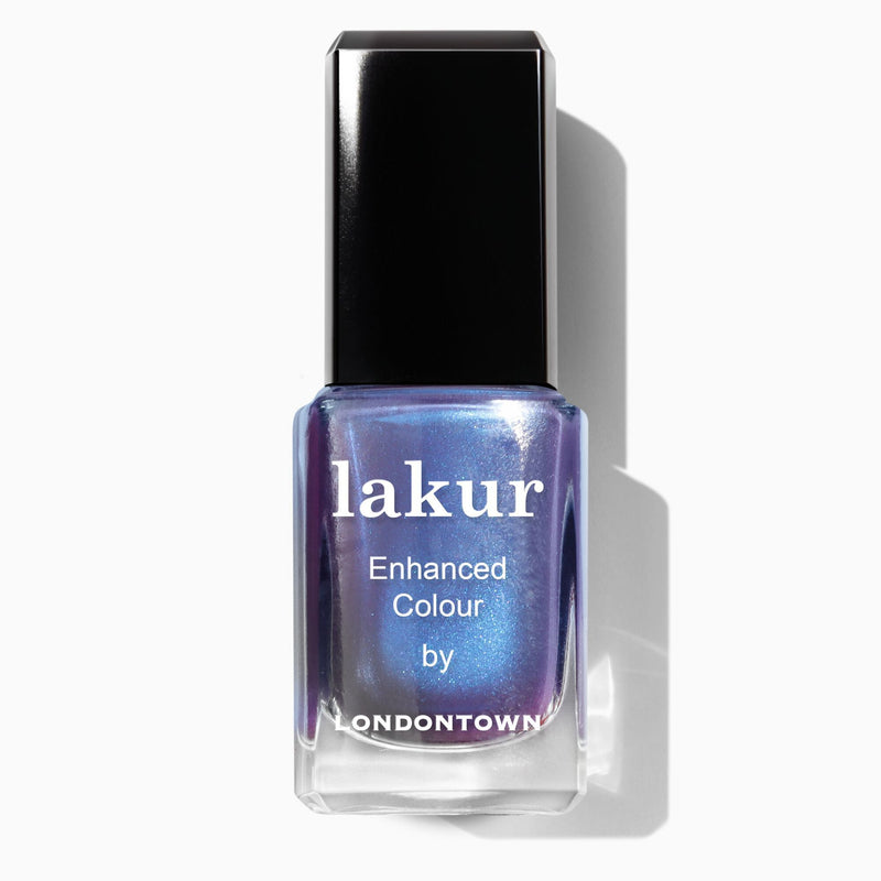 A bottle of LONDONTOWN Wildberry Freeze Lakur nail polish with an iridescent blue shimmer and purple shift.