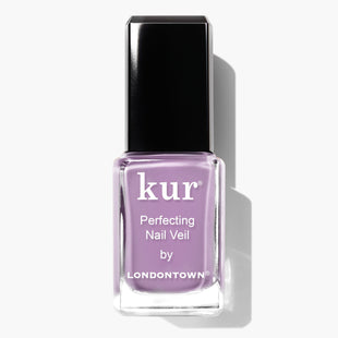 A bottle of LONDONTOWN's Perfecting Nail Veil #9, featuring a light purple nail polish with a black cap, delivers a hint of color while offering care for your nails.