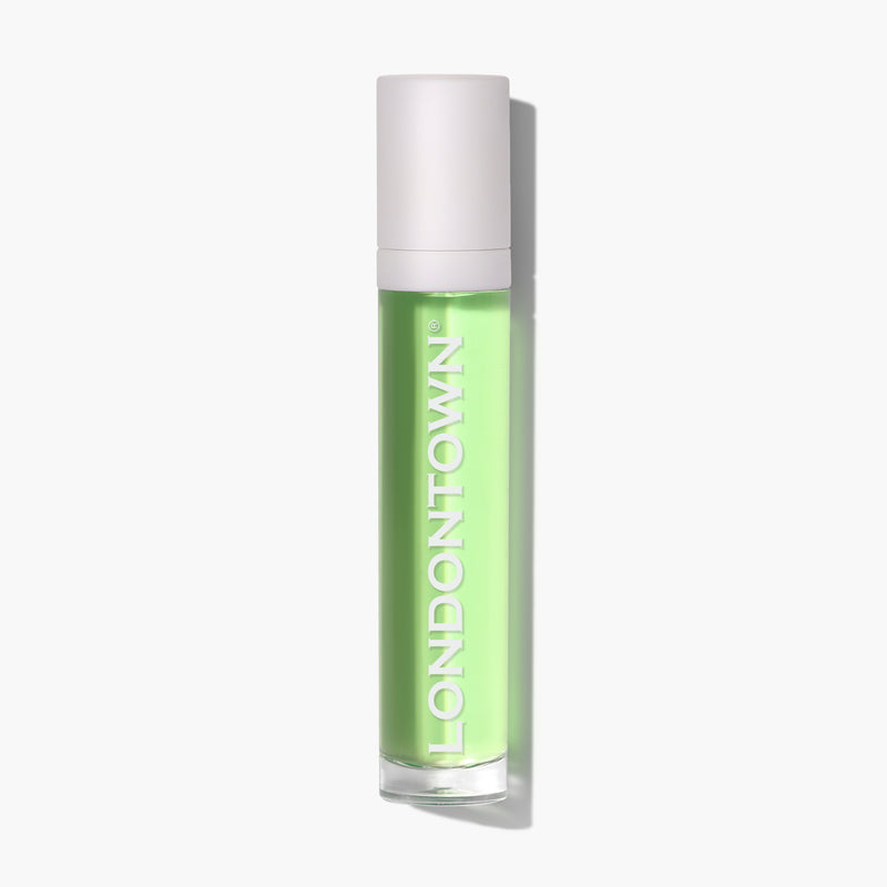 A pocket-sized cylindrical bottle of light green cuticle oil with a white cap, labeled "LONDONTOWN Roll & Glow Cuticle Oil - Agave Pear" in white text.