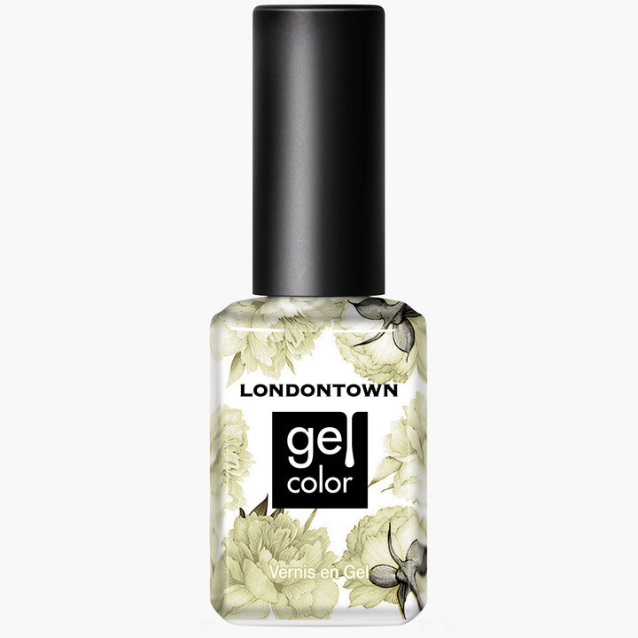 A clear bottle of LONDONTOWN Banana Pudding gel color nail polish with floral design, black cap, and product details on the front sits beside a mellow yellow sheer lipstick, both adding a touch of playful elegance to your beauty essentials.