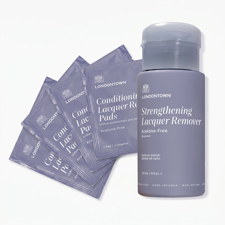 A LONDONTOWN Home & Away Remover Set consisting of a bottle of nail lacquer remover and five individual remover pad packets.