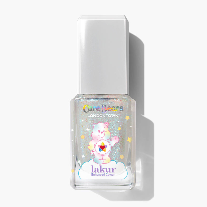 A clear nail polish bottle called Chasing Rainbows by LONDONTOWN features a Care Bears design with a bear and stars on the label, radiating soft hopefulness and gentle charm.
