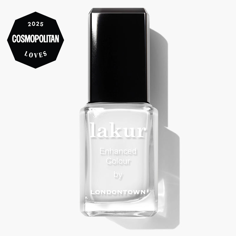 A bottle of LONDONTOWN Duchess crème white nail polish with a black cap is shown on a white background—perfect for French manicures. A "Cosmopolitan Loves 2025" badge appears in the top left corner.