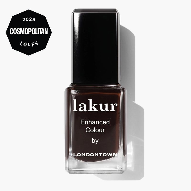 A bottle of LONDONTOWN Midnight Mocha nail polish in a rich espresso shade, featuring a "2025 Cosmopolitan Loves" badge in the corner.