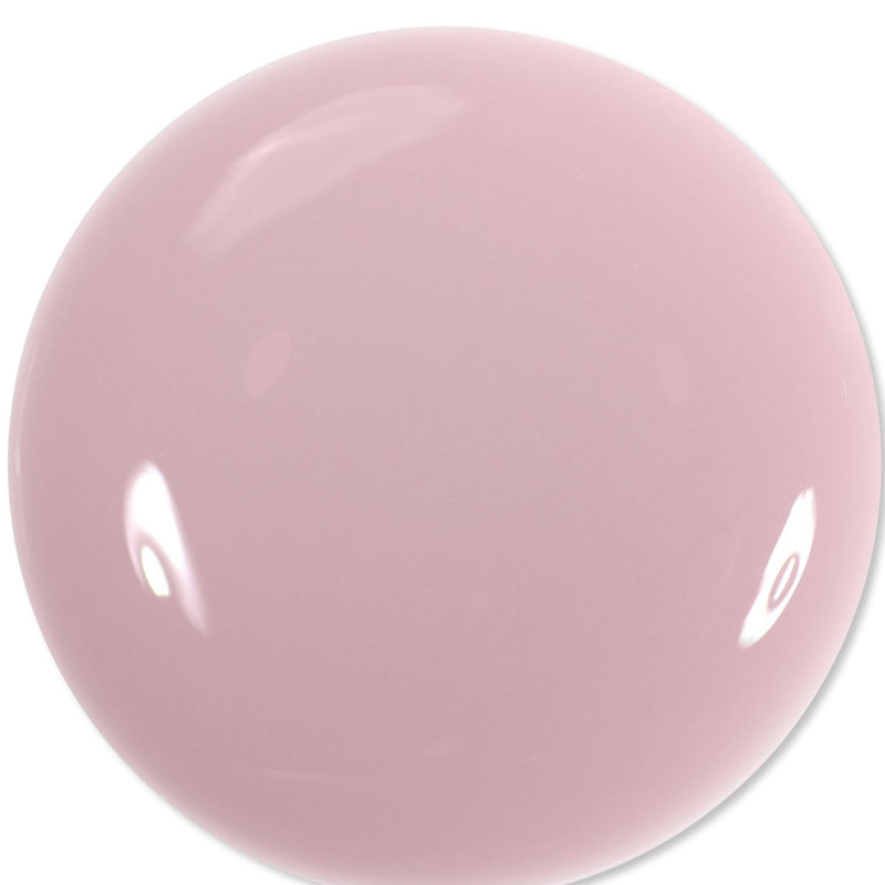 Dream State by LONDONTOWN is a smooth, round, light pink object with reflective highlights and a soft glow on its surface, set against a white background.