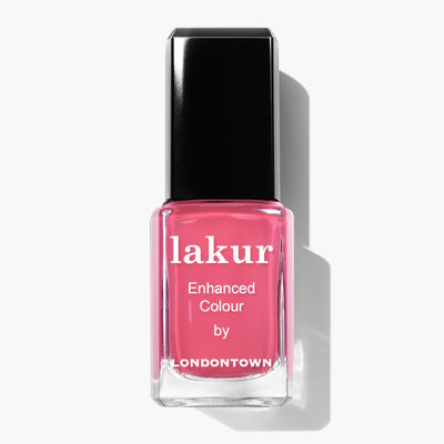 A bottle of LONDONTOWN Electric Flamingo (Professional) nail polish, featuring a flamboyant pink hue and a sleek black cap.