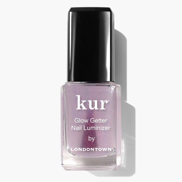 A bottle of Glow Getter Nail Luminizer by LONDONTOWN—a light purple shimmery polish with a black cap for an ethereal look and expert nail care.