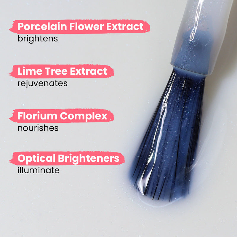 Close-up of a brush applying Illuminating Nail Concealer (Professional) by LONDONTOWN with text listing ingredients: Porcelain Flower Extract brightens dull nails, Lime Tree Extract rejuvenates, Florium Complex nourishes, and Optical Brighteners illuminate discolored nails.